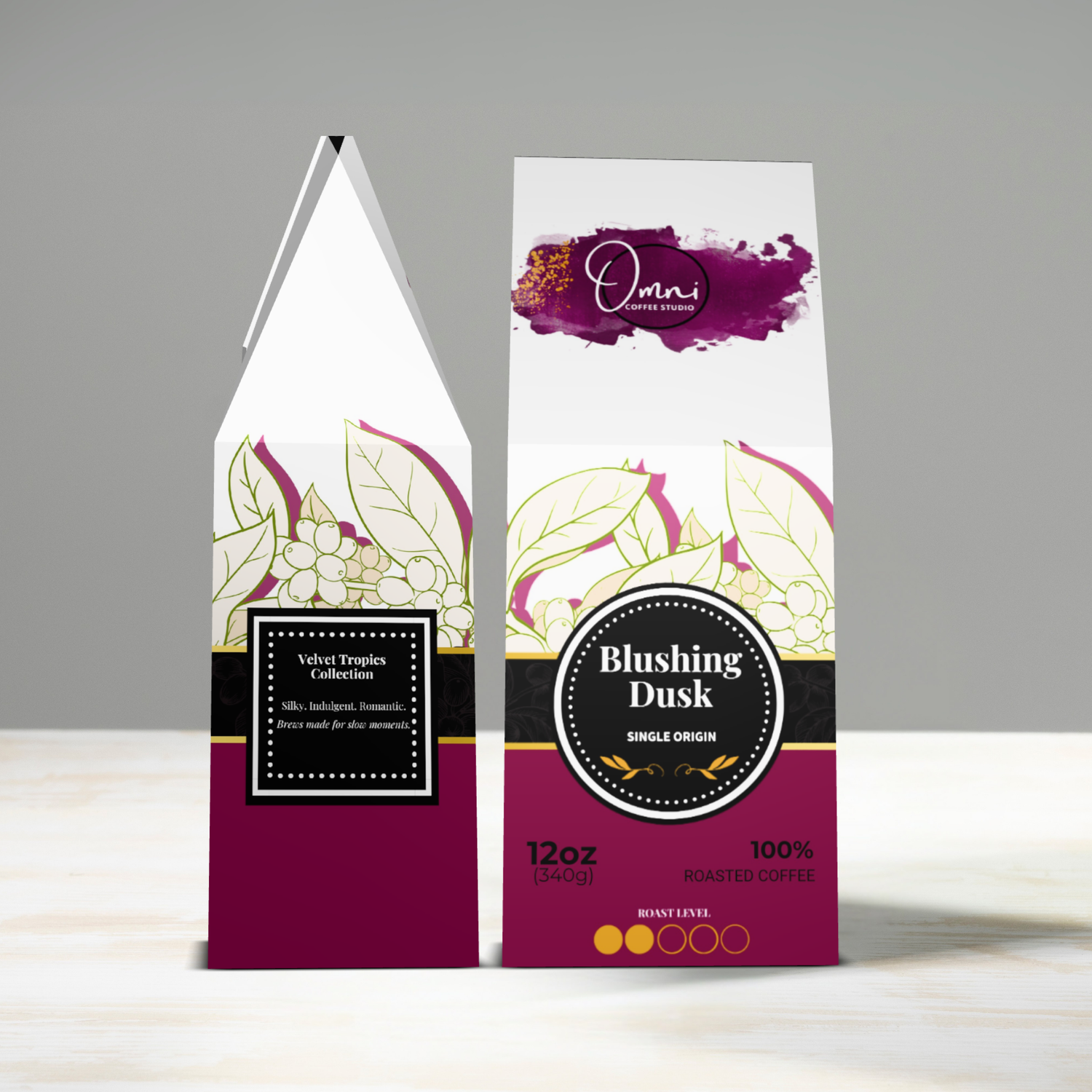 Coffee package with 'Blushing Dusk' branding on a gray background
