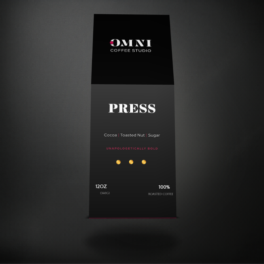 Press dark roast specialty coffee packaging showing roast level by Omni Coffee Studio, front view on dark background.