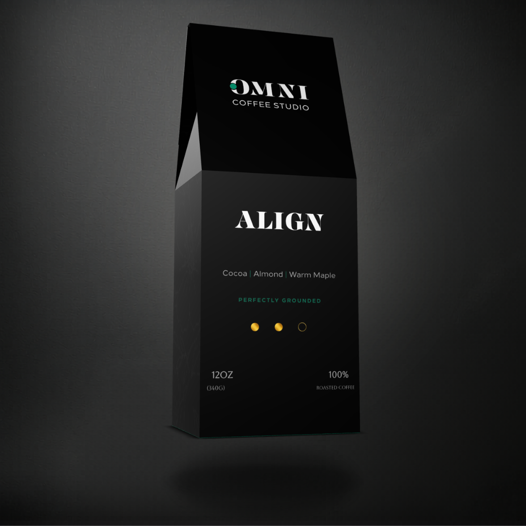 Align medium roast specialty coffee packaging showing roast level by Omni Coffee Studio, left view on dark background.