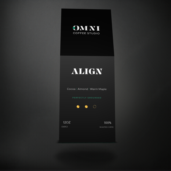 Align medium roast specialty coffee packaging showing roast level by Omni Coffee Studio, front view on dark background.