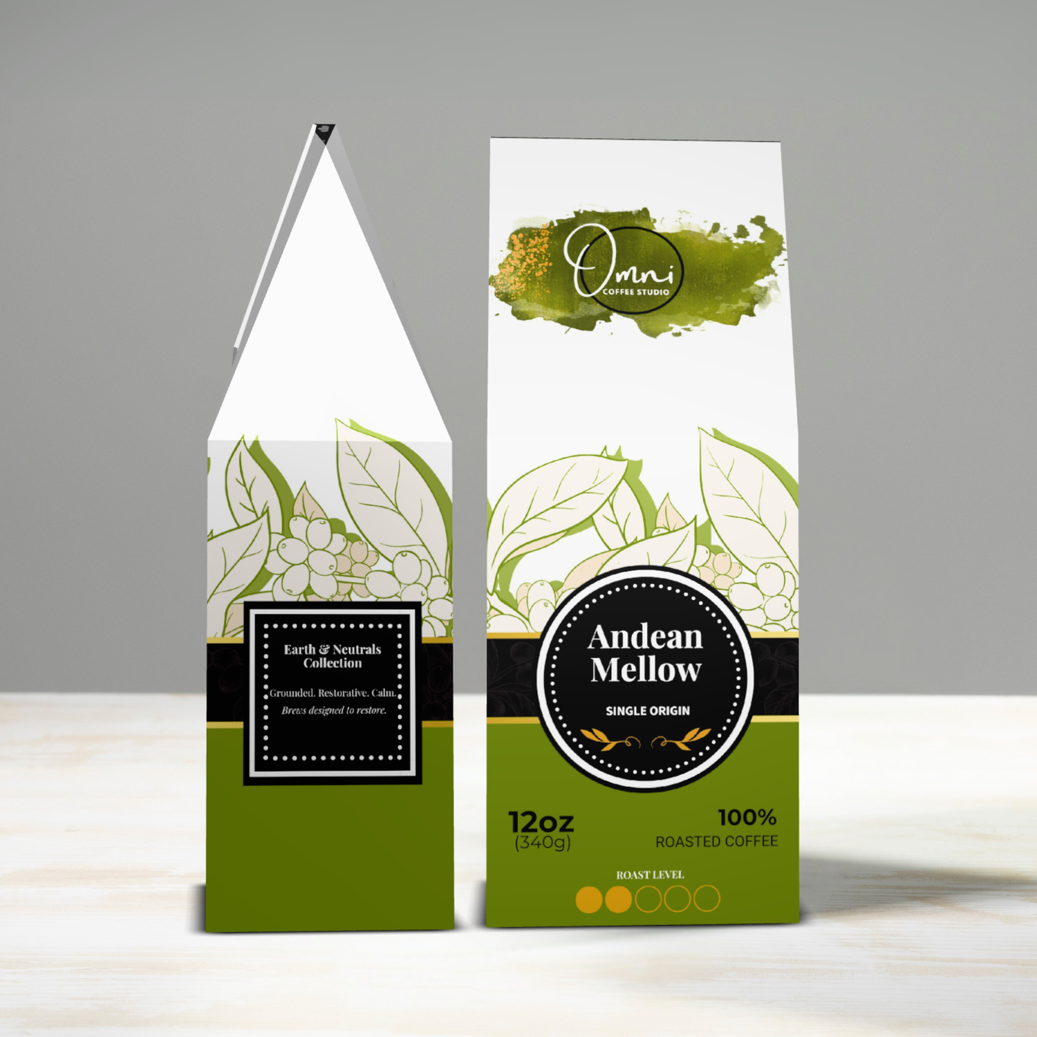 Two coffee packages with 'Omni Coffee' branding on a gray background