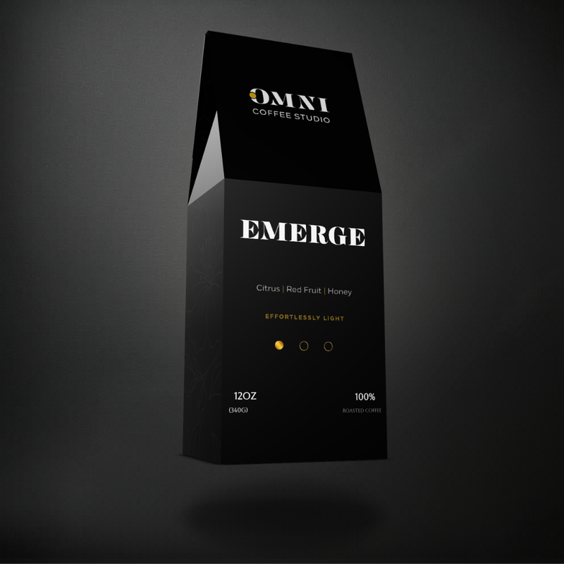 Emerge light roast specialty coffee packaging showing roast level by Omni Coffee Studio, left view on dark background.