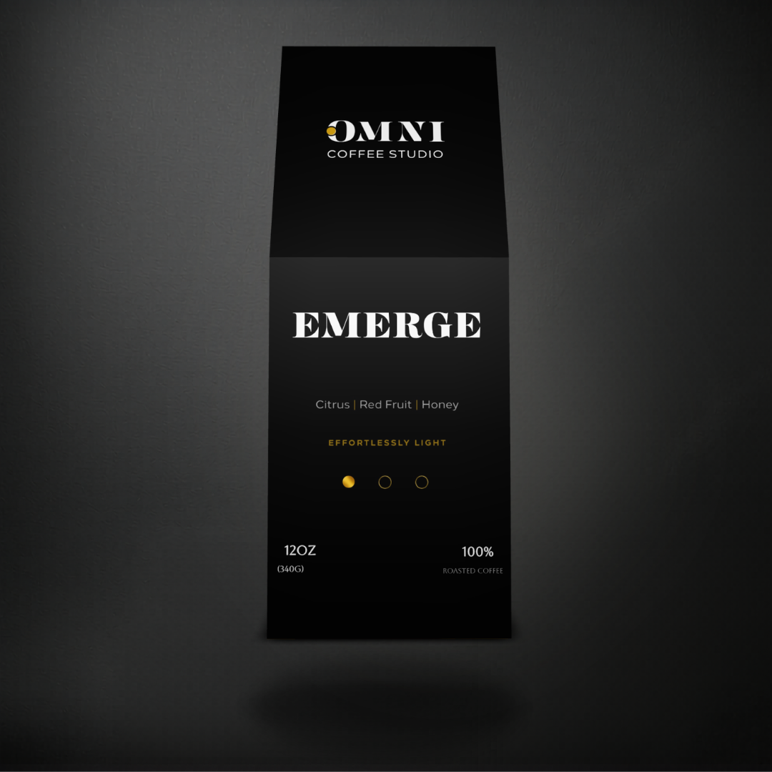 Emerge light roast specialty coffee packaging showing roast level by Omni Coffee Studio, front view on dark background.