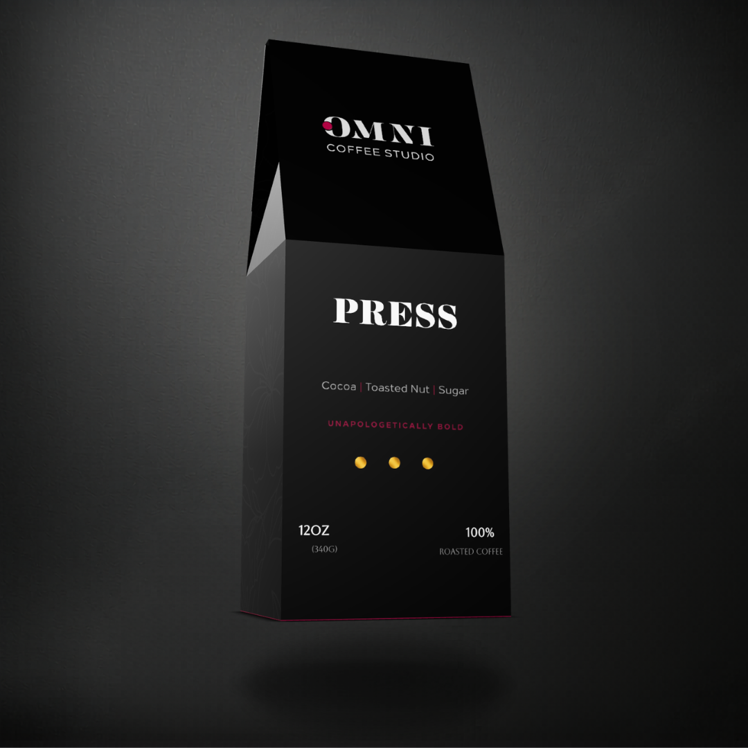 Press dark roast specialty coffee packaging showing roast level by Omni Coffee Studio, left view on dark background.