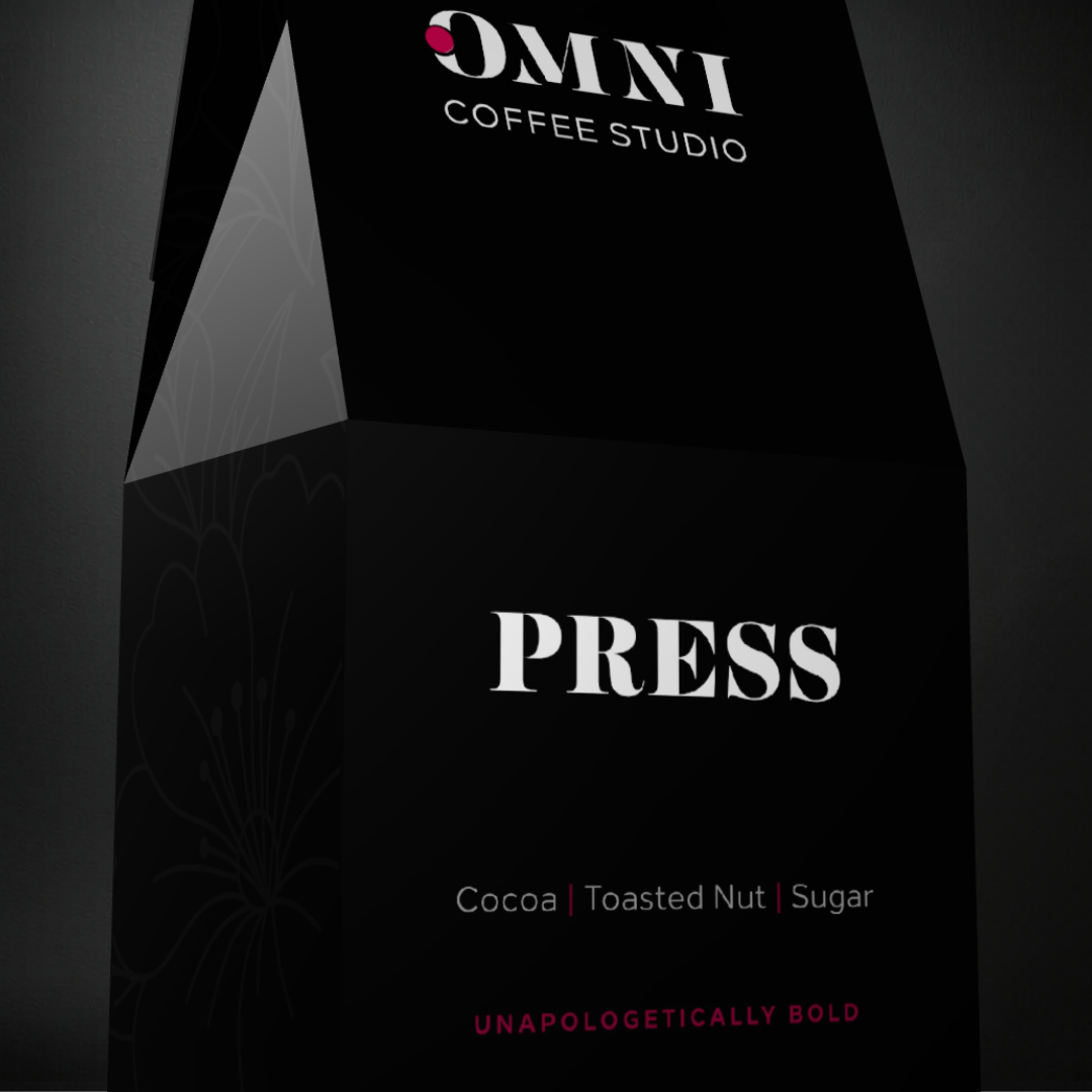 Press coffee packaging by Omni Coffee Studio, showing a detailed view of packaging on a dark background.
