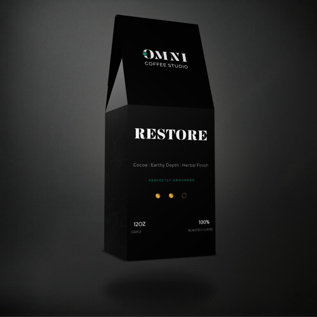 Restore medium-dark roast specialty coffee packaging showing roast level by Omni Coffee Studio, left view on dark background.