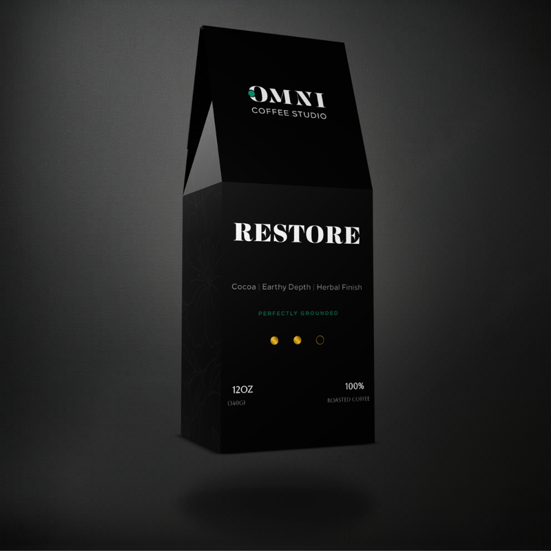 Restore medium-dark roast specialty coffee packaging showing roast level by Omni Coffee Studio, left view on dark background.