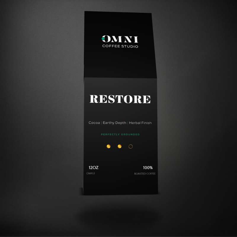 Restore medium-dark roast specialty coffee packaging showing roast level by Omni Coffee Studio, front view on dark background.
