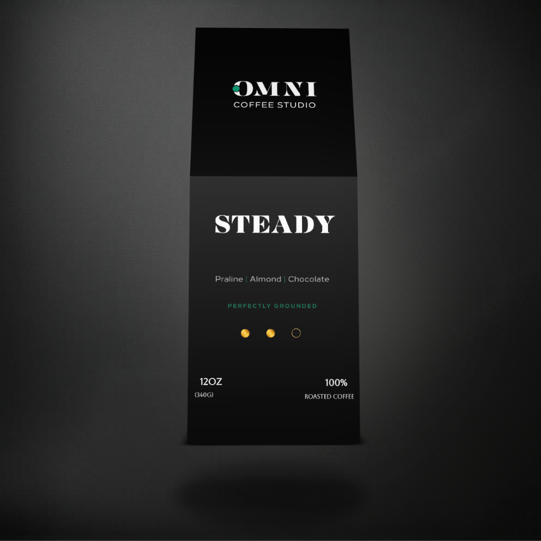 Steady medium roast specialty coffee packaging showing roast level by Omni Coffee Studio, front view on dark background.